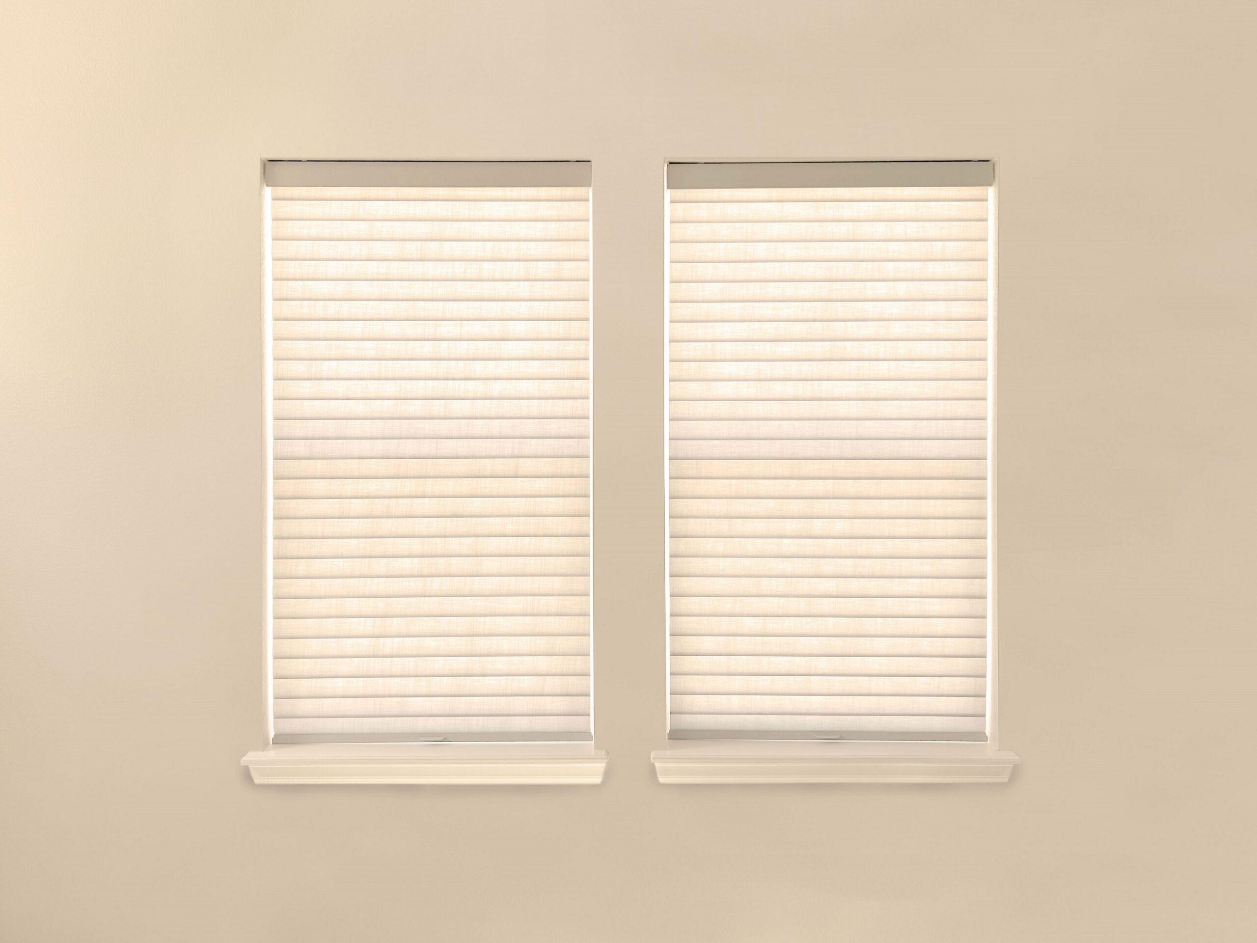 Hunter Douglas Sonnette Cellular Roller Shades with Light Filtering fabric and LiteRise cordless operation.