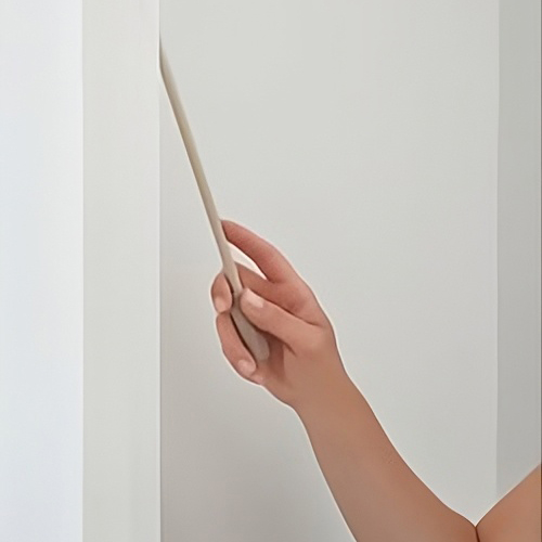 Hand operating window treatment system with a remote or wand.