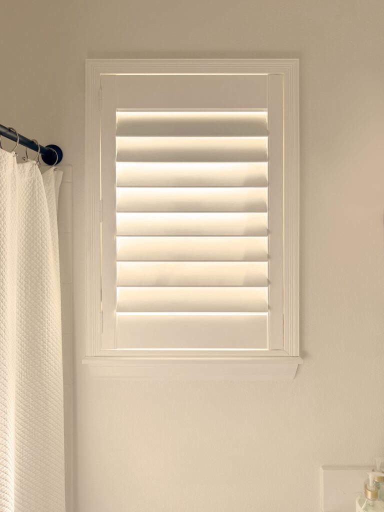 Hunter Douglas Palm Beach Polysatin Shutters with Hidden Tilt and Z Frame Operating System in Lakewood Home