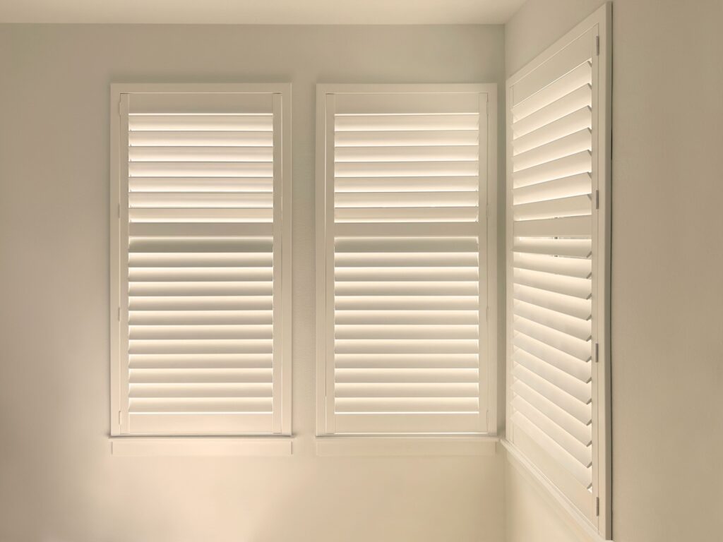 Modern Hunter Douglas Palm Beach Polysatin Shutters with Motorized Tilt and Z Frame installed in Castle Rock Home