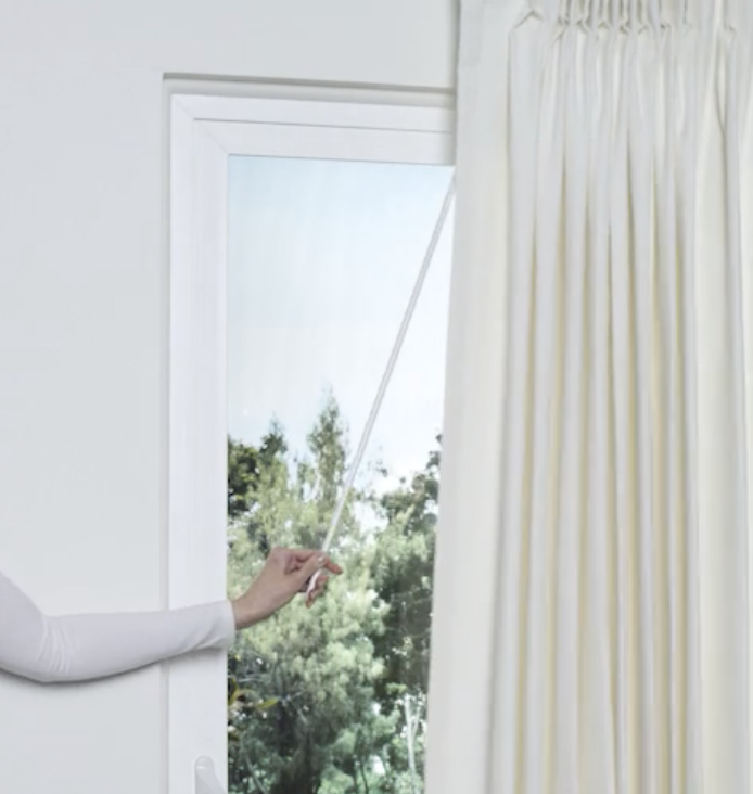 Carole Fabrics drapery with wand control as the operating system for Colorado Homes