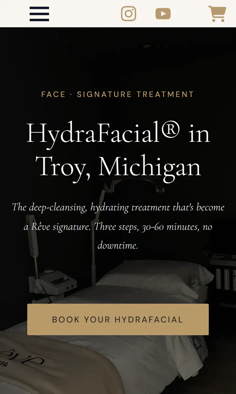 Rêve Medical Spa HydraFacial in Troy, Michigan page on a phone: the service and city in the heading, what it is and how long it takes, and a Book your HydraFacial button