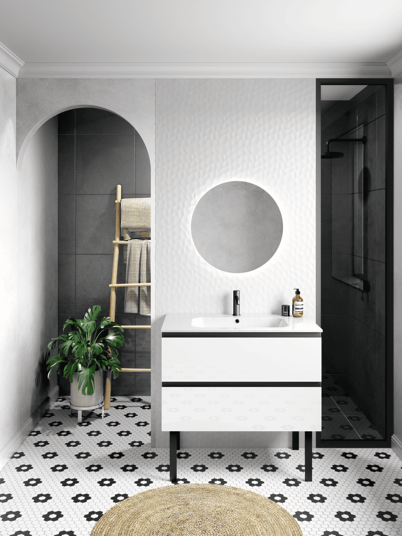 Une salle de bain contemporaine et raffinée, mettant en valeur un meuble blanc brillant aux lignes épurées, avec un miroir circulaire rétroéclairé pour une ambiance douce et moderne. Le carrelage hexagonal noir et blanc au sol apporte une touche graphique élégante, tandis que les murs texturés et l’arche ajoutent de la profondeur à l’espace. Une douche à l'italienne avec une paroi en verre noir complète ce design harmonieux. L’ajout d’éléments naturels, comme la plante verte et l’échelle en bois, apporte une note chaleureuse et apaisante.