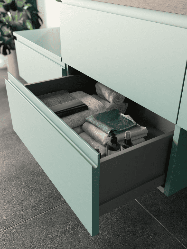 Ce tiroir de salle de bain allie fonctionnalité et design moderne. La façade en coloris vert aqueux apporte une touche de fraîcheur, tandis que l’intérieur spacieux permet un rangement optimisé des serviettes et des produits de soin. Les détails soignés, comme les poignées intégrées, offrent une esthétique épurée, idéale pour un espace ordonné et élégant.