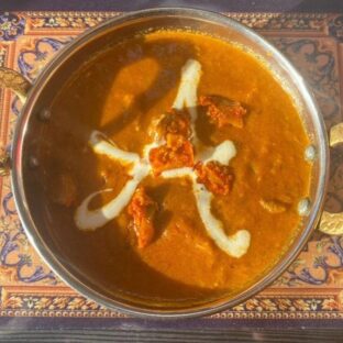 Halal Lamb Achari – Spicy lamb dish with authentic flavors at Ammonight Restaurant Japan.