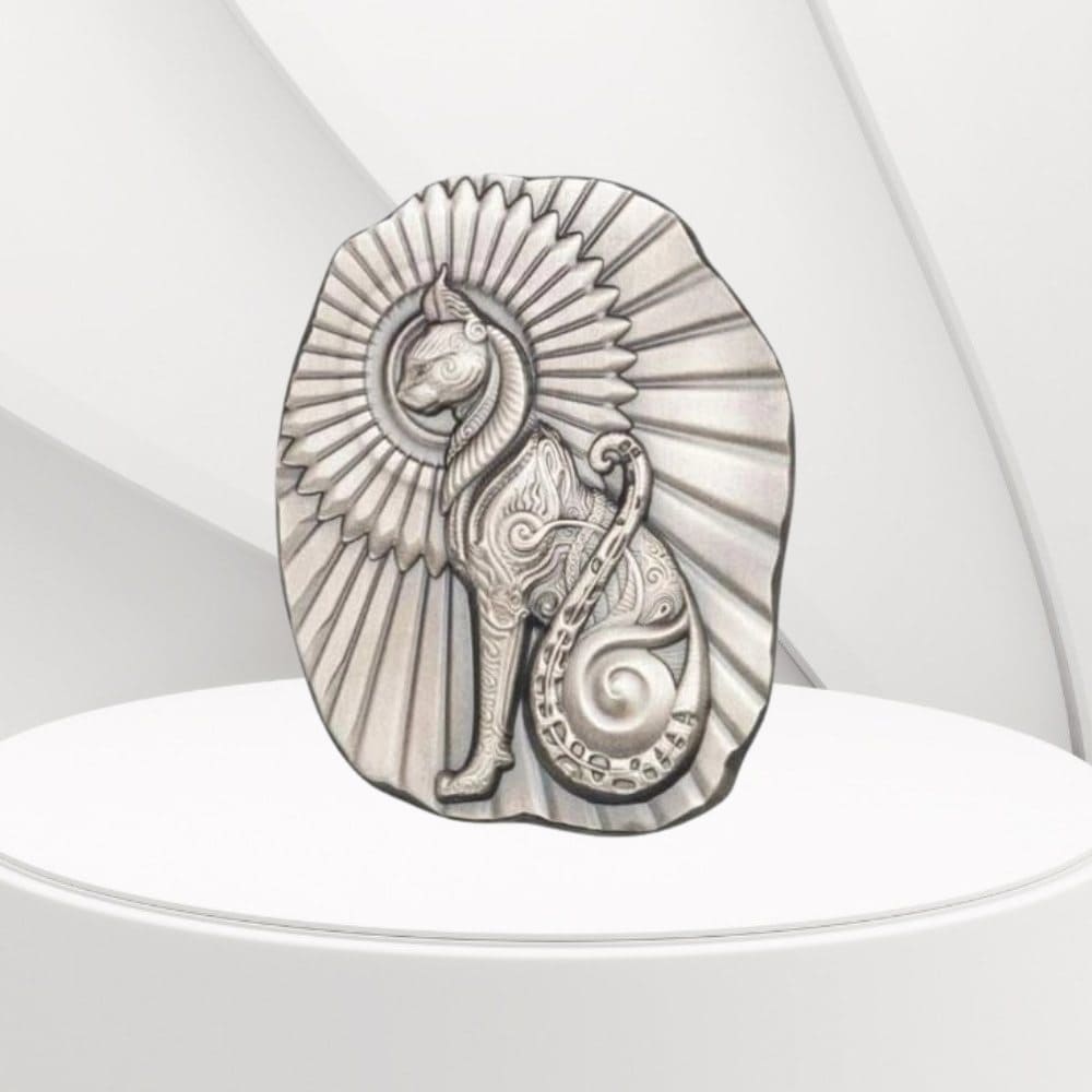 "Ultra-high relief 5oz silver bar featuring an ornate Egyptian cat design with an antiqued finish and fan-shaped background, crafted by Argentia."