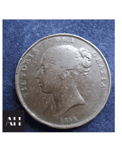 clseup image of a 1954 penny coin showing the obverse bun head side