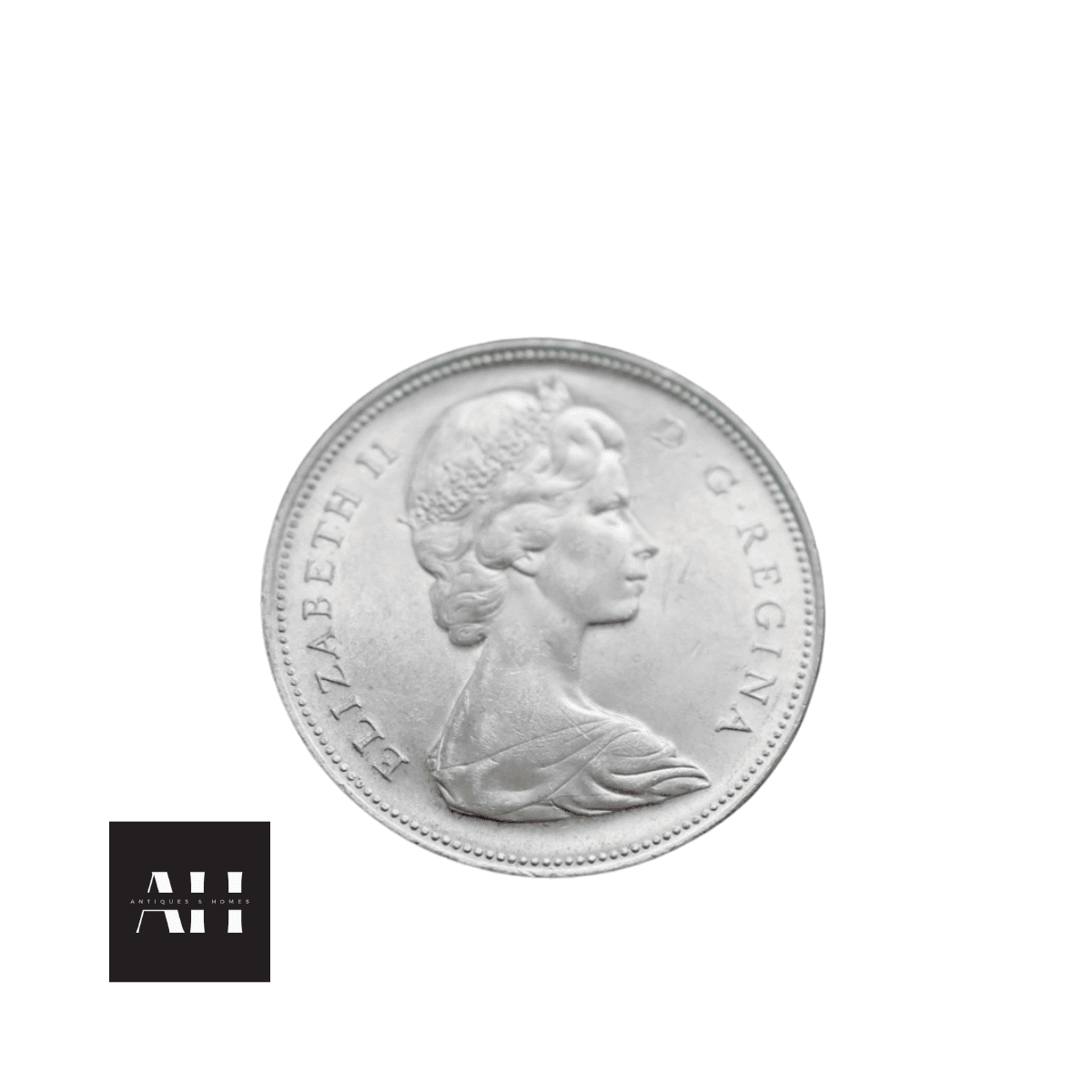 Obverse view of a 1966 Canadian Silver Dollar showing young portrait of Queen Elizabeth II.