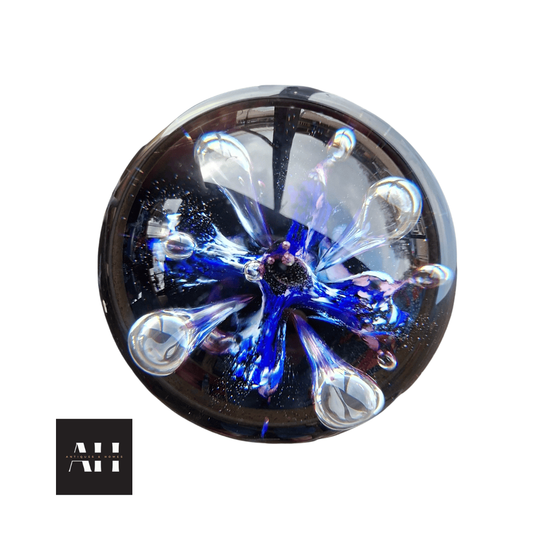 Close-up detail of Moonflower motif within a Caithness Moonflower Paperweight highlighting internal design.