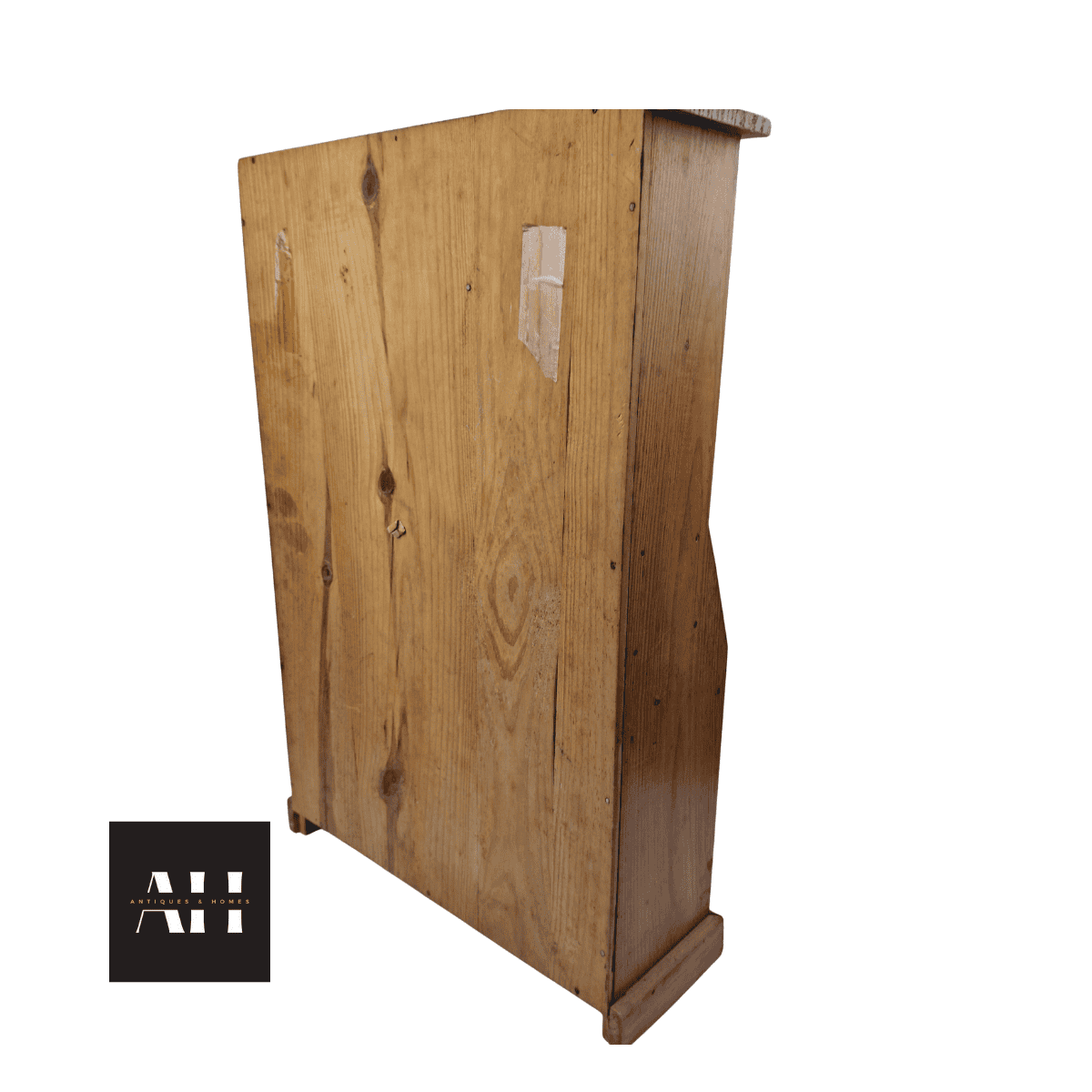 Back view of a miniature pine dresser showing wooden construction and vintage finish.