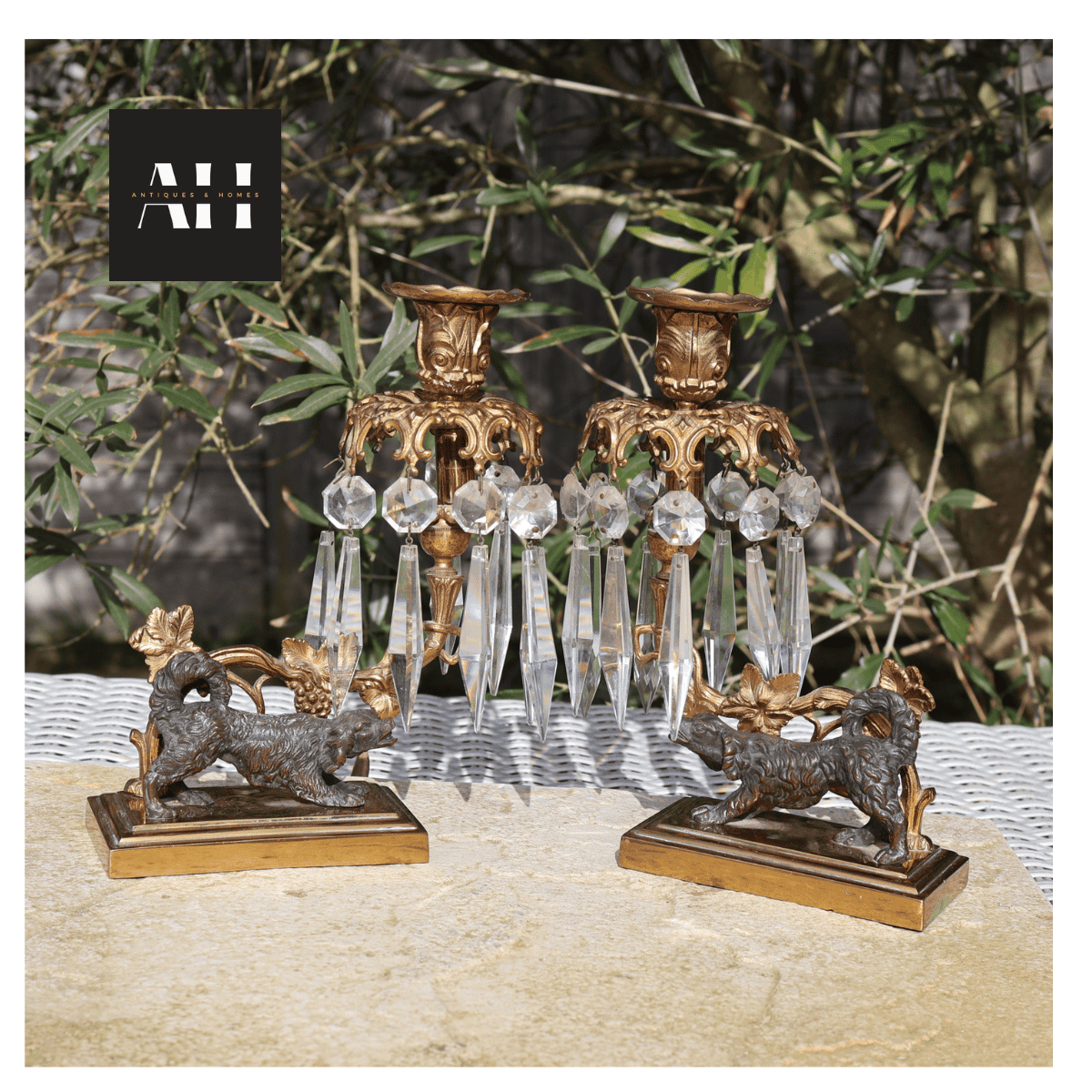 background view of antiques gilt spaniel candleabra