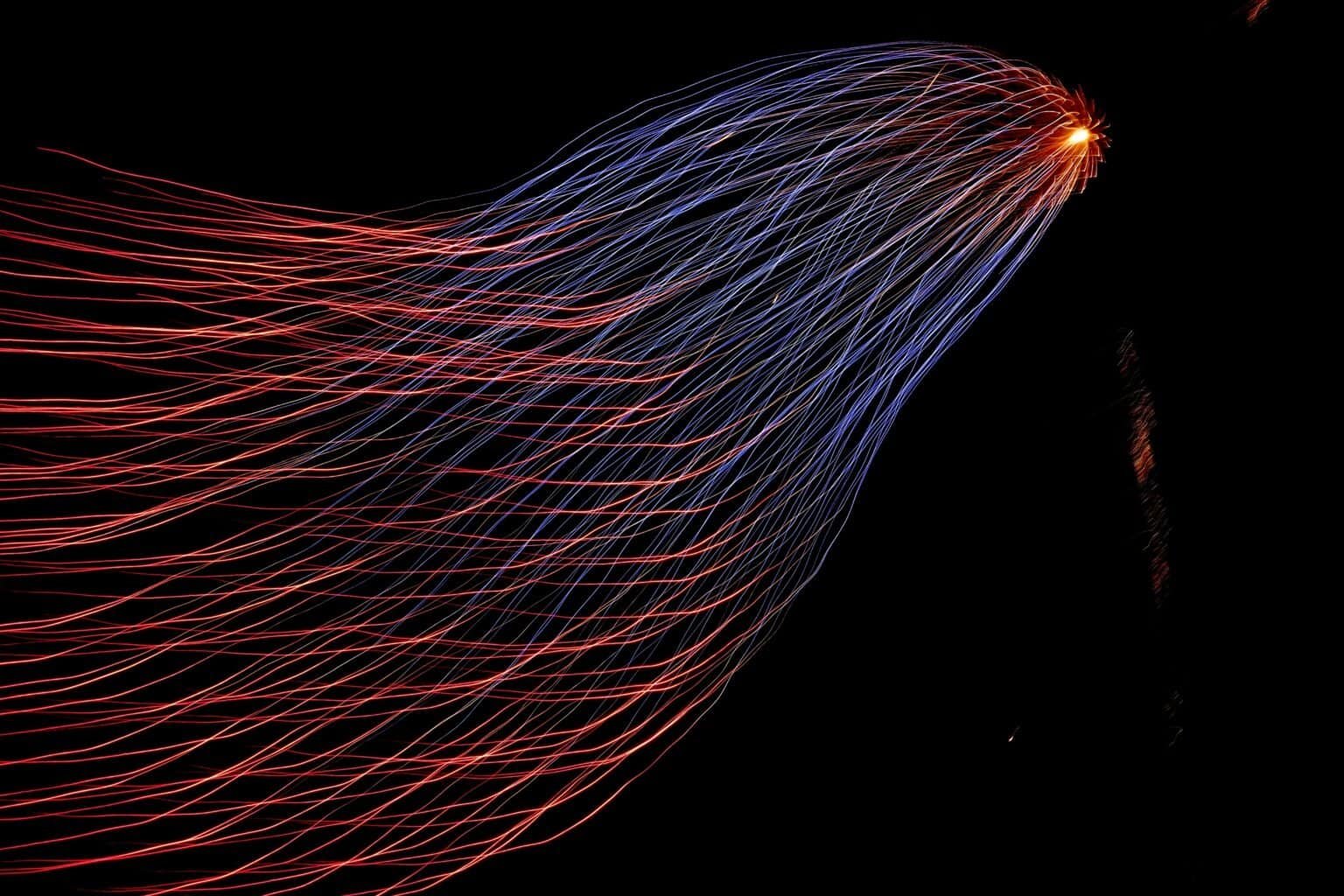 Machine learning personalization: abstract red and blue light trails