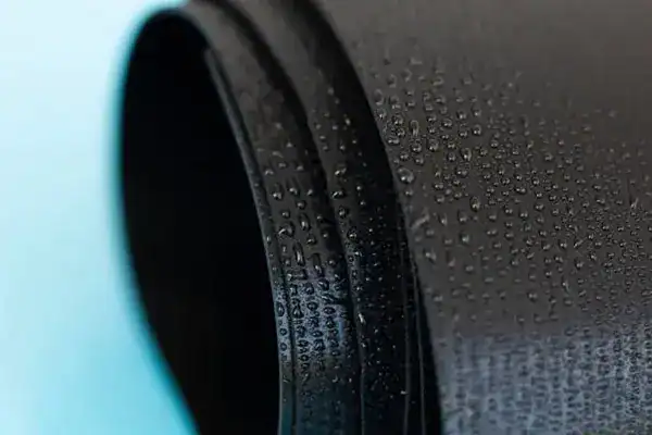 Geomembrane liner and protective geotextile for lined detention basins