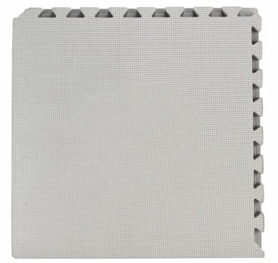 Grijze puzzelmat met verbindingsstukken.