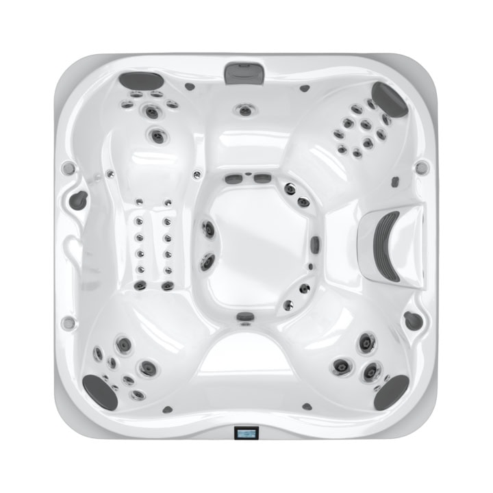 Bovenaanzicht moderne witte jacuzzi met meerdere jets.