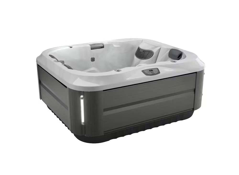Moderne vierkante jacuzzi met grijze buitenkant.