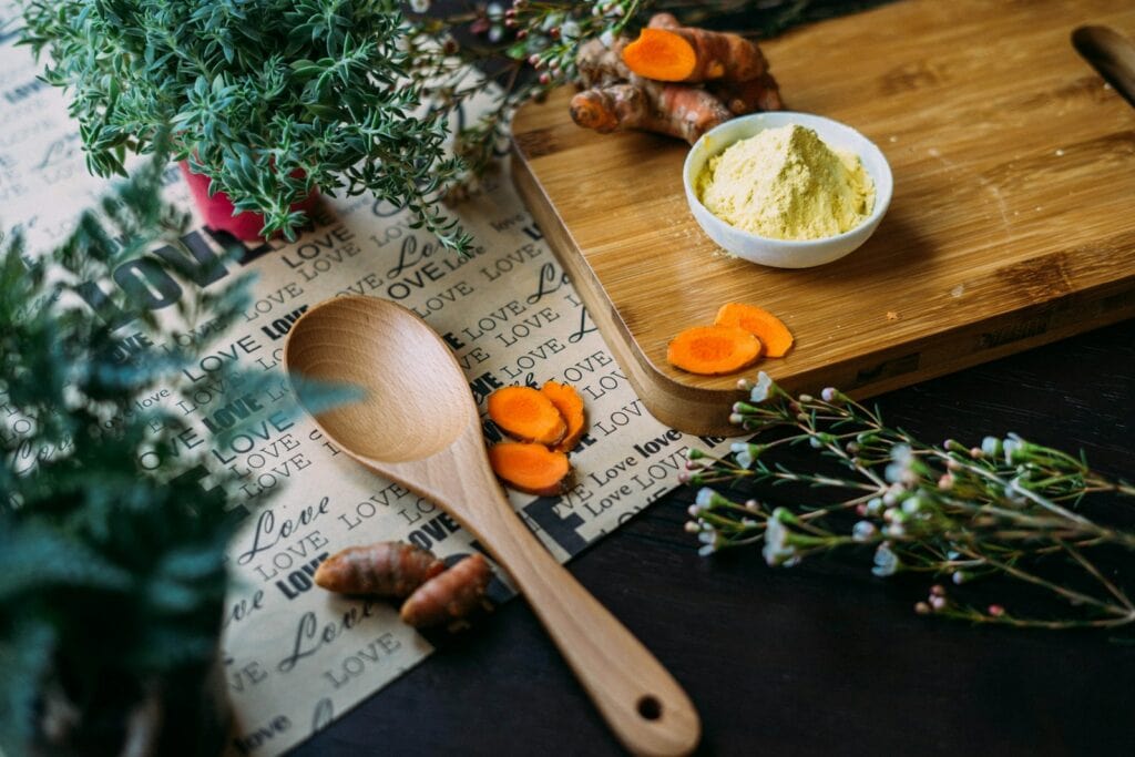 Ayurveda, Holistic Health, wooden ladle and chopping board with ginger during daytime