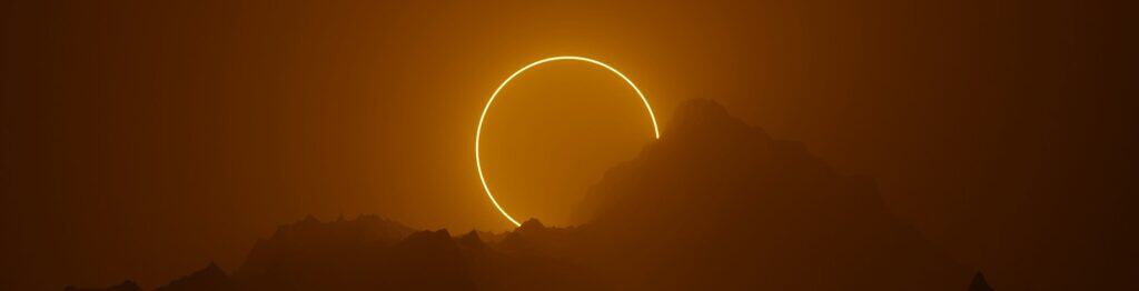 the sun is setting over a body of water