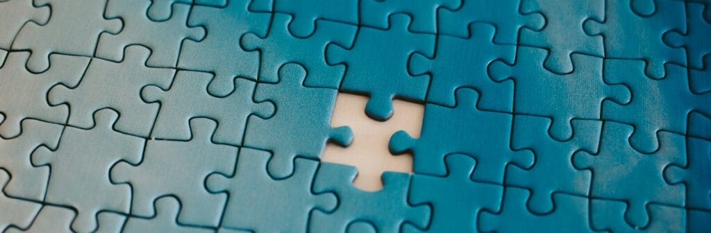 A piece of a puzzle with a missing piece
