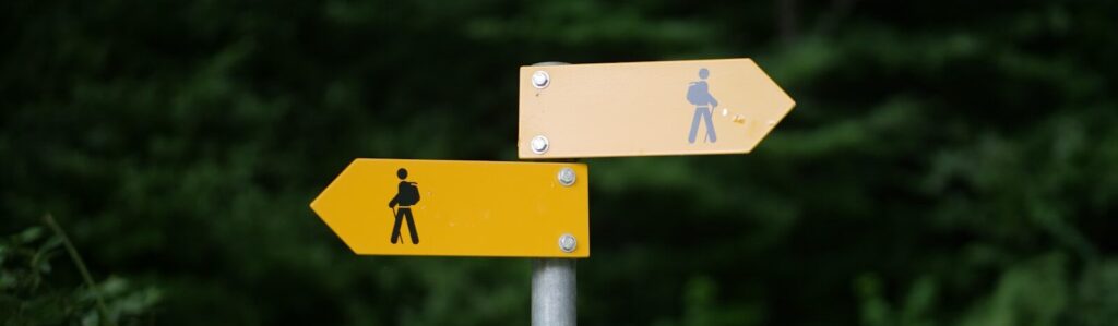 a sign with a couple of people on it