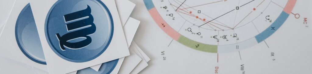 Astrology chart and tarot cards with zodiac symbols, perfect for mystical themes.