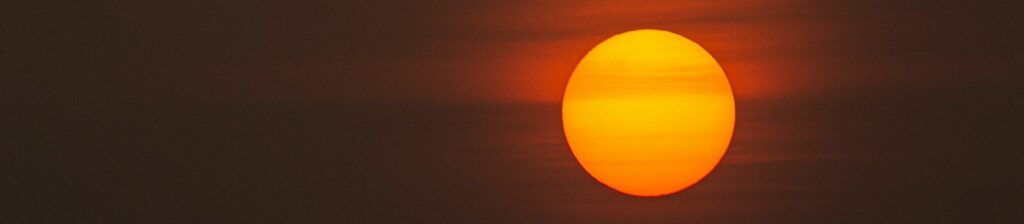 low-light photo of sun