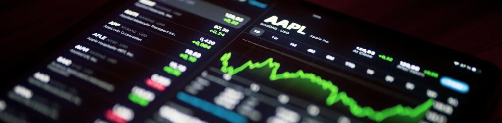 a close up of a cell phone with a stock chart on it