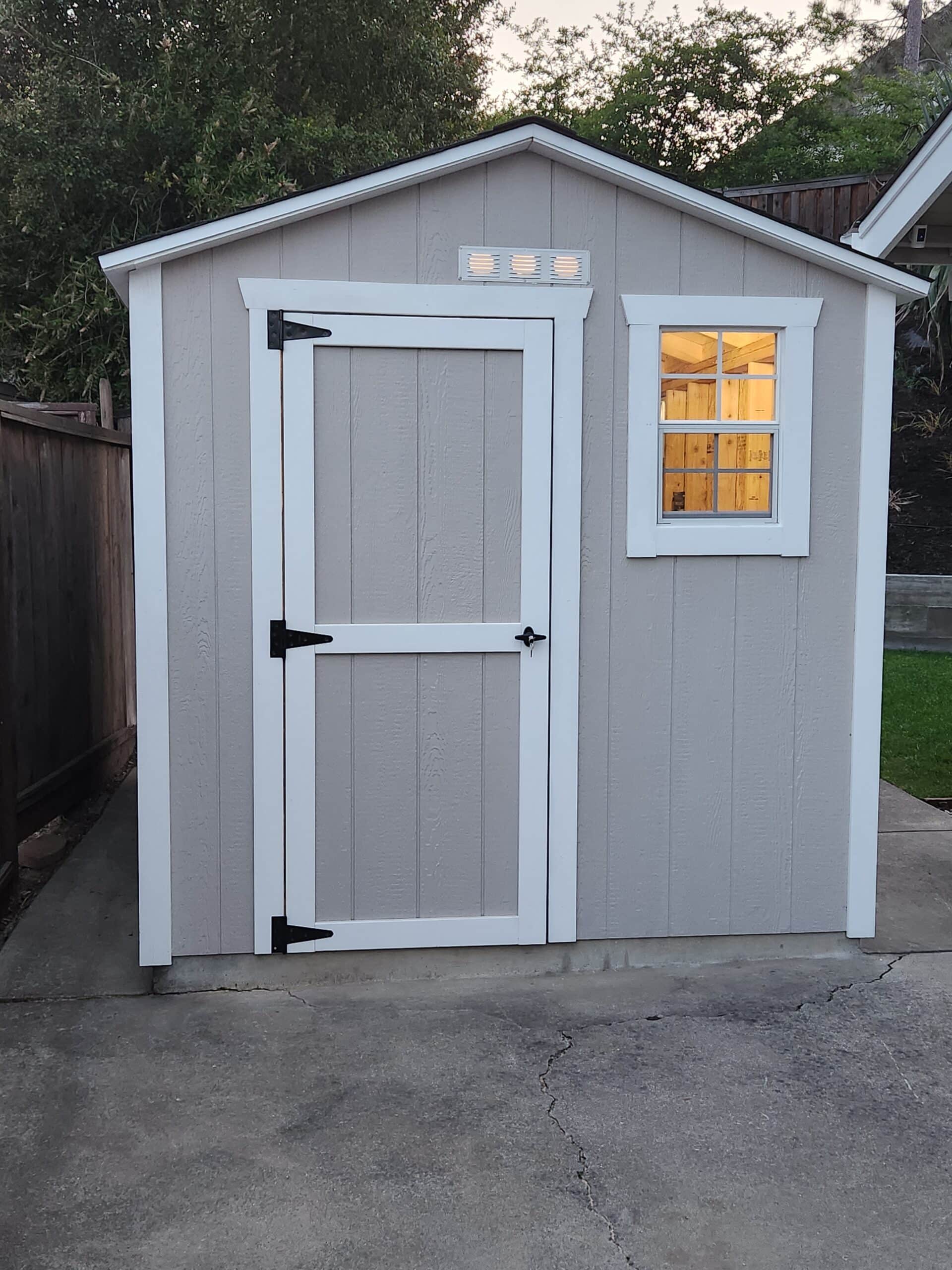 Atlas Shed garden shed with window and ventilation for durability.