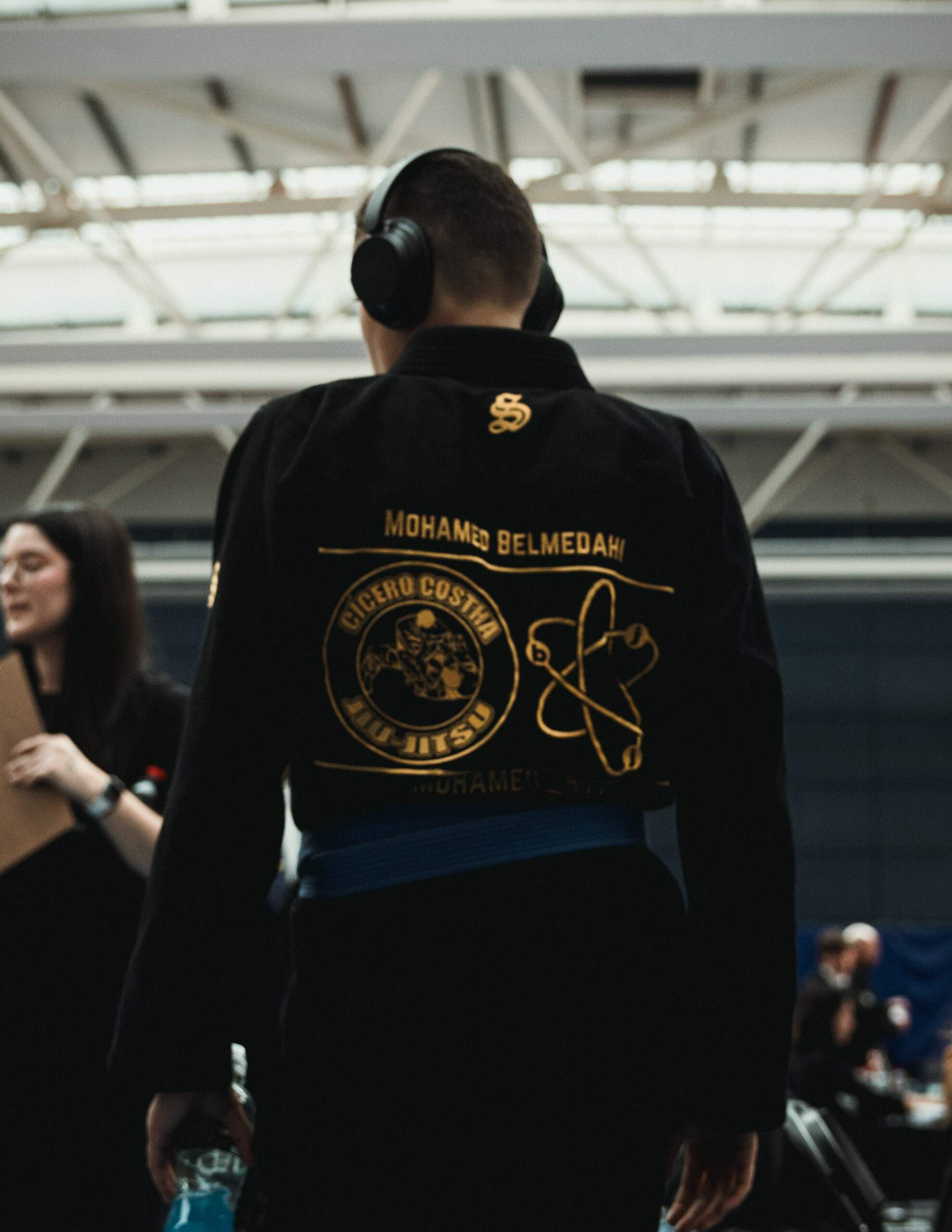 Atom Jiu Jitsu athlete Mohamed Belmedah wearing a black gi and headphones before competing at the European Kids Championships in Dublin