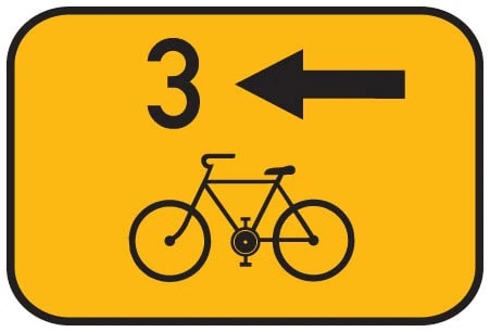 Dopravní značka Směrová tabulka pro cyklisty vlevo