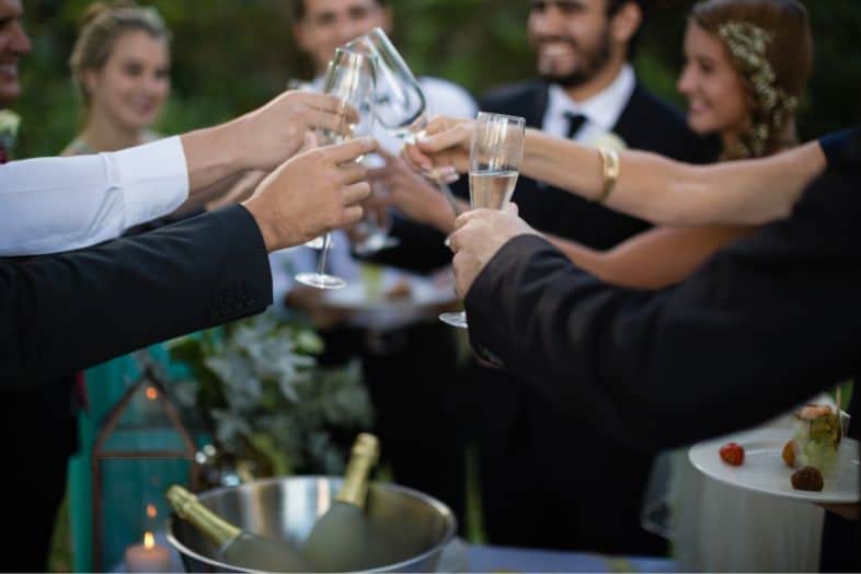 People toasting champagne