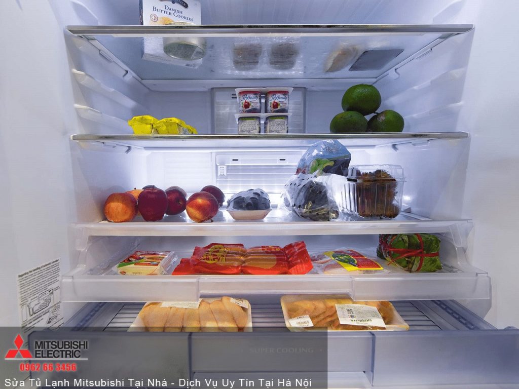 Fresh fruits and vegetables stored inside a clean, modern refrigerator, emphasizing quality produce preservation for healthy living.
