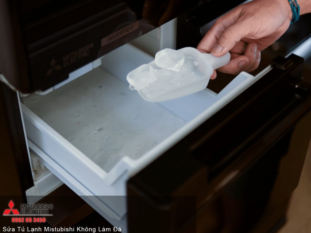 Ice removal from Mitsubishi refrigerator frost buildup for optimal cooling performance.