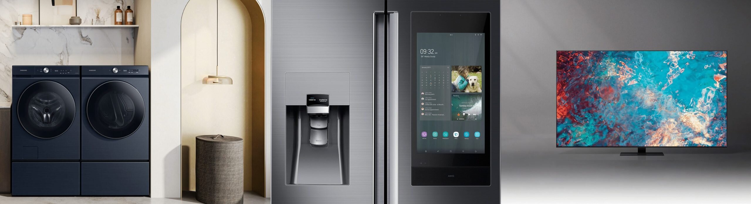 Modern Samsung home appliances including washing machines, refrigerator with water dispenser, smart touchscreen refrigerator, and flat-screen TV in a contemporary kitchen setting.