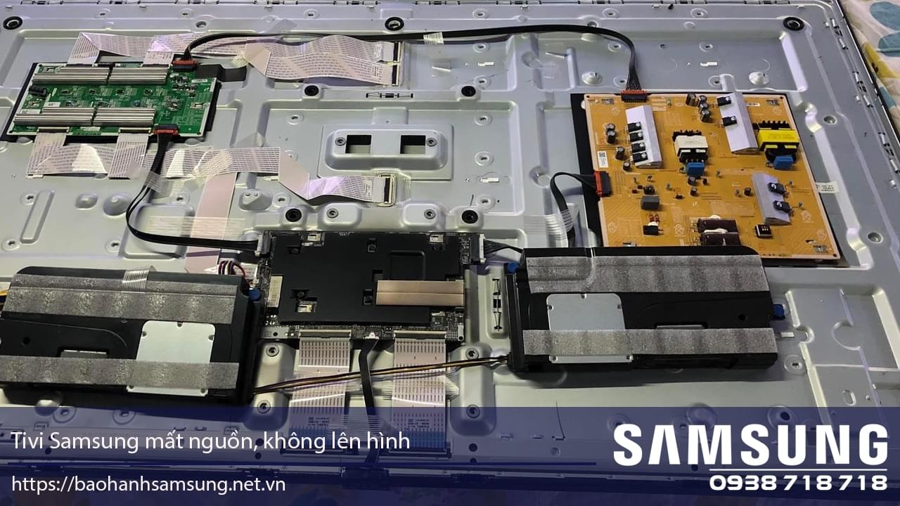 Internal components of a Samsung TV showing power supply and circuit boards for repair or diagnostics.