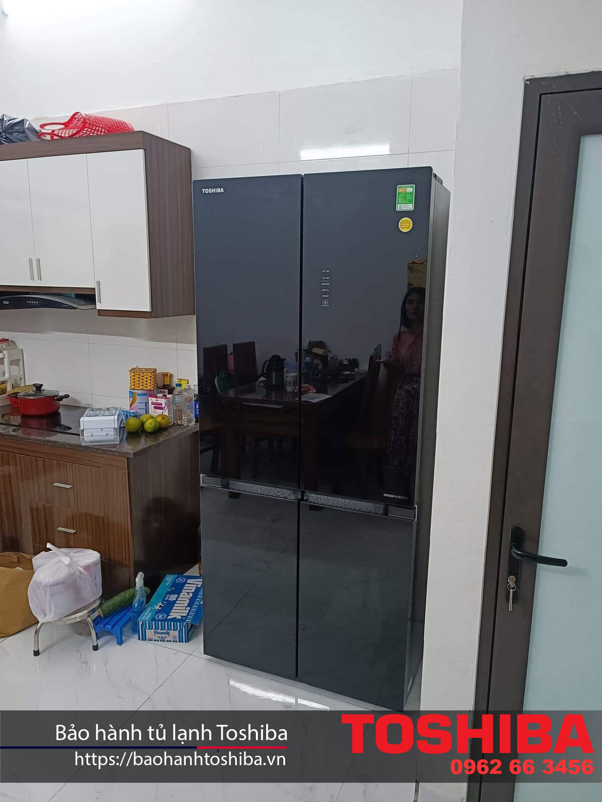 Toshiba refrigerator in a modern kitchen setting, highlighting reliable warranty service in Vietnam for Toshiba appliances.