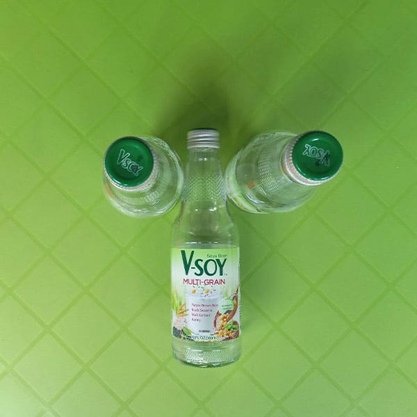 Botol kaca bekas V-Soy Multi-Grain 300ml, transparan, cocok untuk kemasan ulang minuman, kerajinan tangan, atau daur ulang