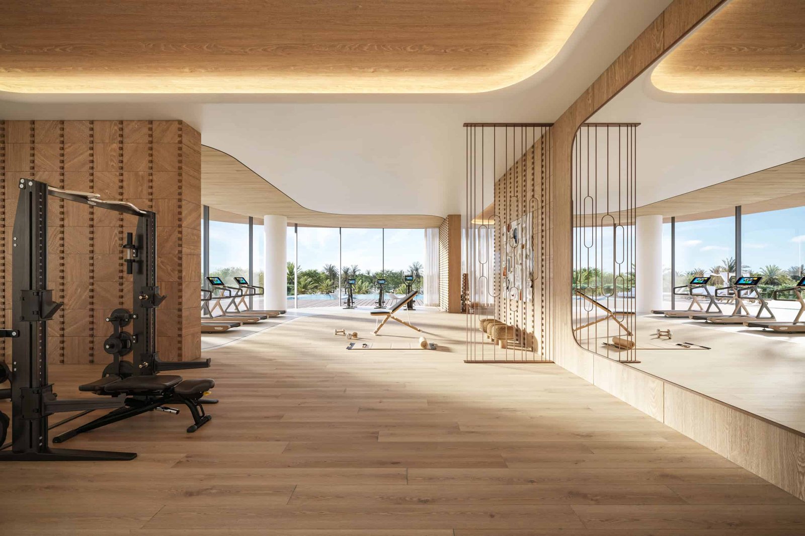 Modern fitness area with scenic water views in Dubai waterfront residences.