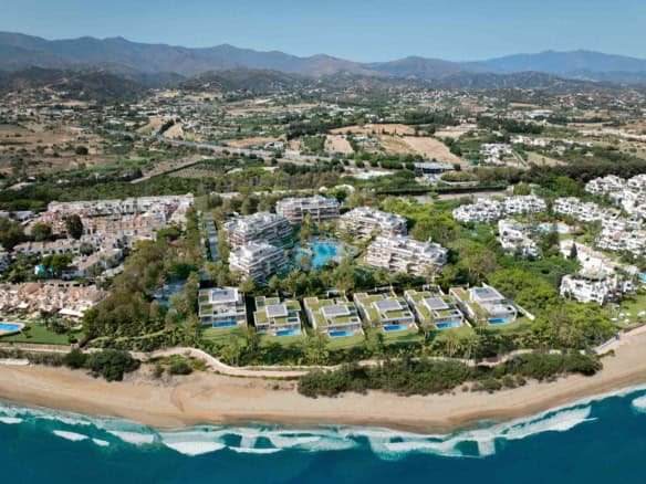 Luxury beachfront residences in Estepona with stunning sea views and modern design.
