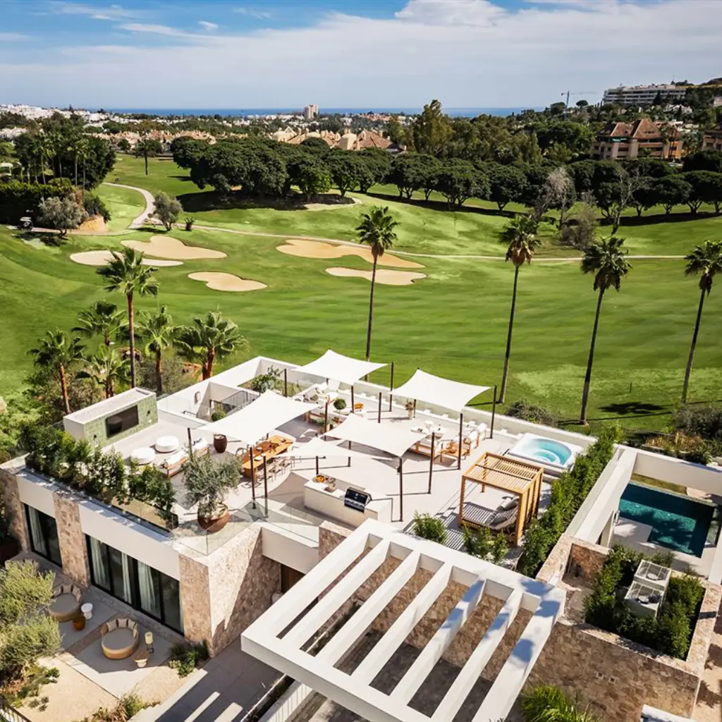 Luxury golf course villa with private pool and terrace in a scenic setting.