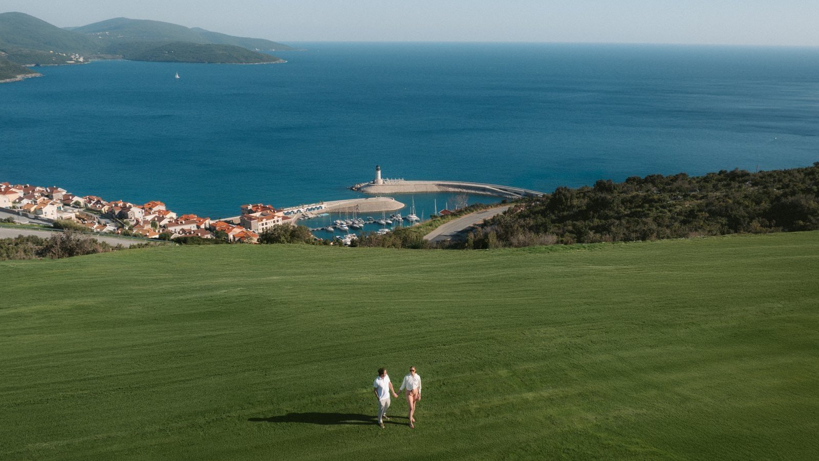 Stunning view of the Adriatic Sea from luxury villas in Montenegro, featuring golf estates and sceni.