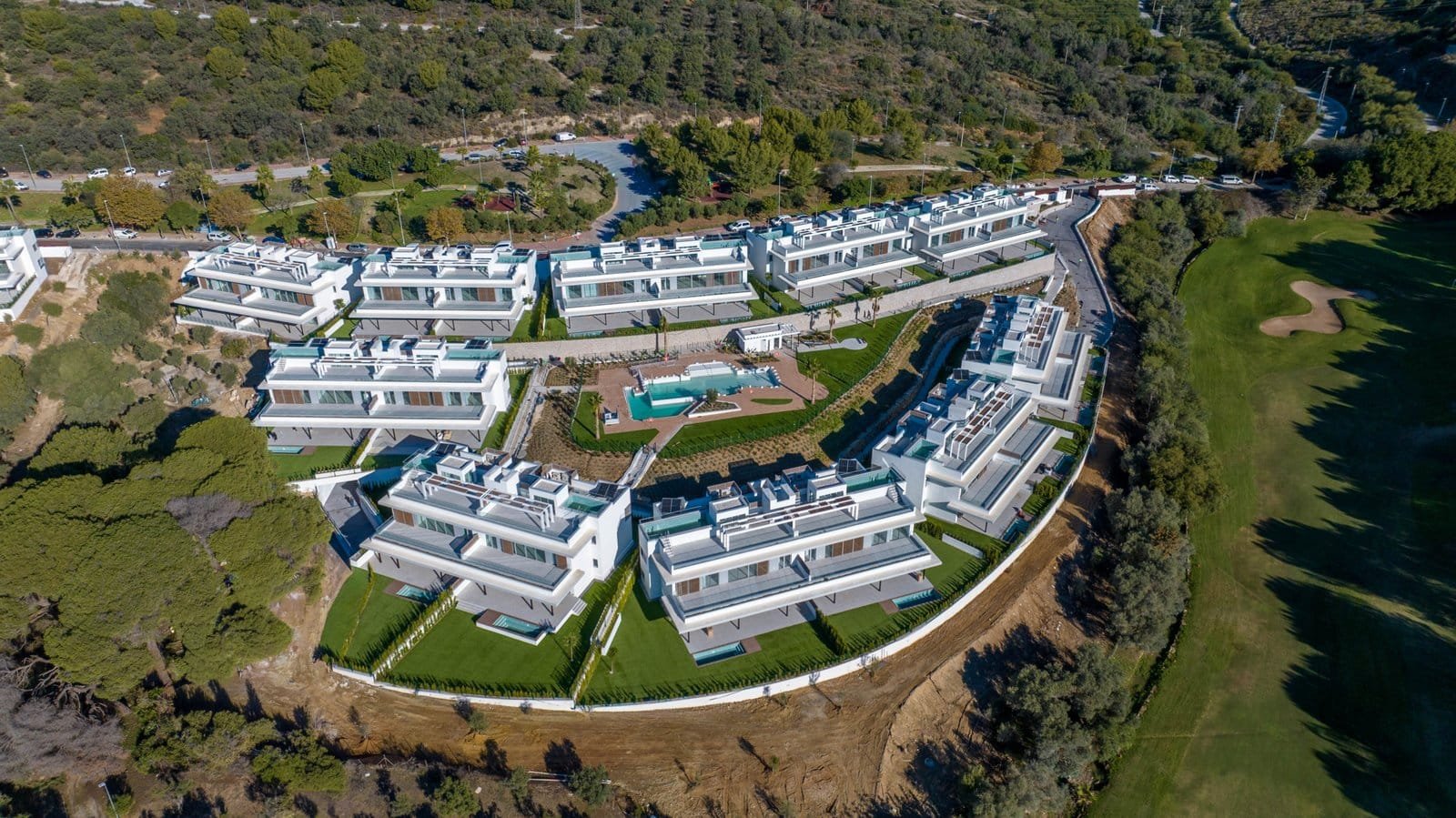 Aerial view of Santa Clara Golf Apartments Marbella, frontline golf residences with modern design an.