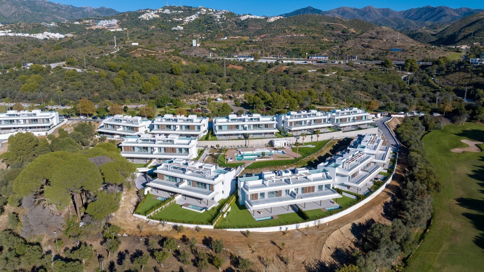 Santa Clara Golf Apartments Marbella - Frontline golf residences with modern design and scenic views.