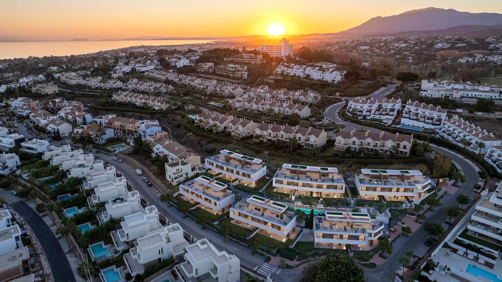 Modern luxury townhouses in El Campanario, Estepona, with stunning sunset views and exclusive amenit.