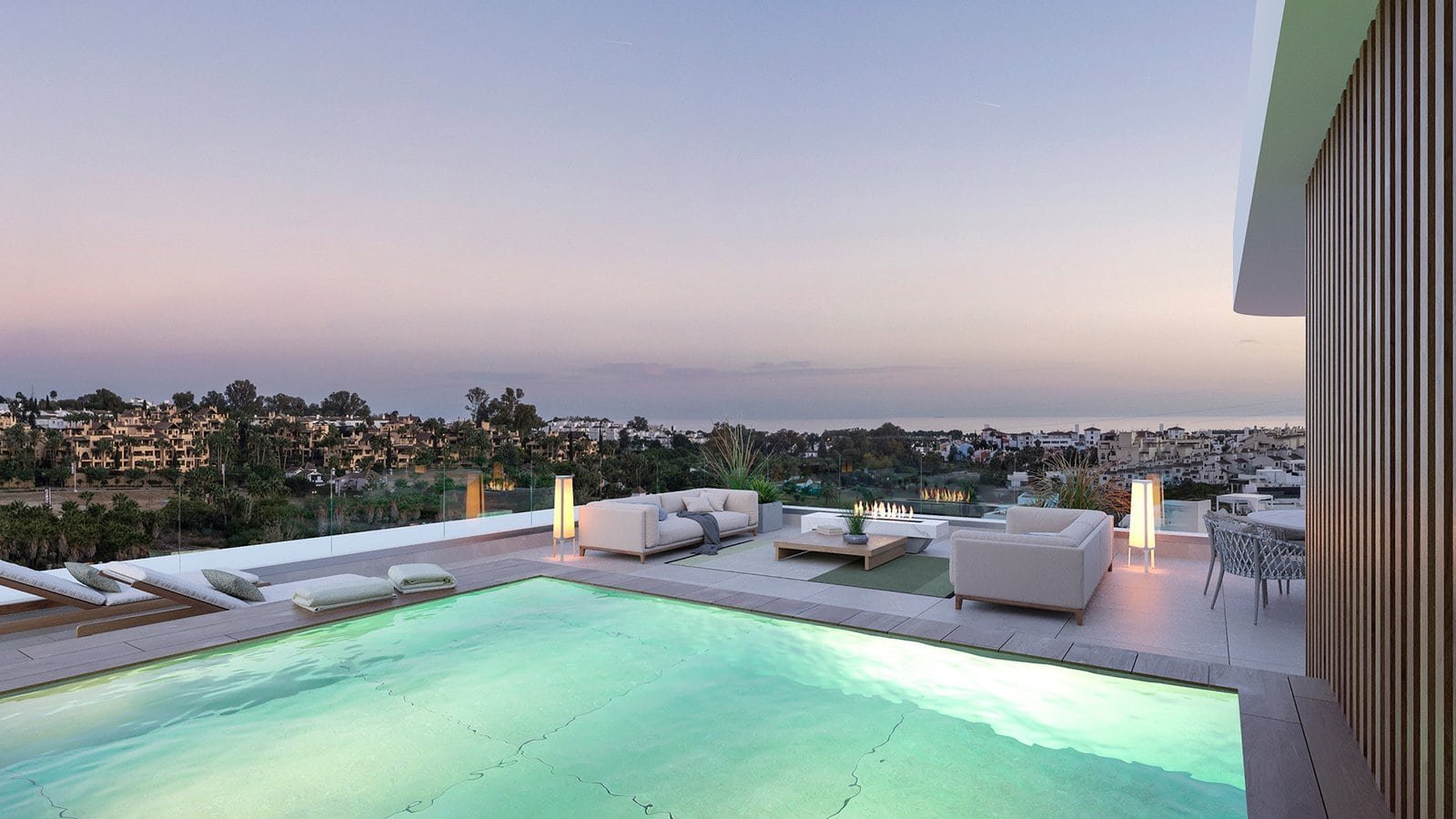 Modern rooftop pool and lounge area at luxury townhouses in El Campanario, Estepona.
