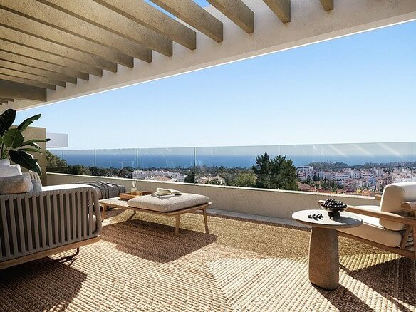Seaside balcony offering stunning ocean views, perfect for relaxing at OMNIA Estepona luxury apartme.