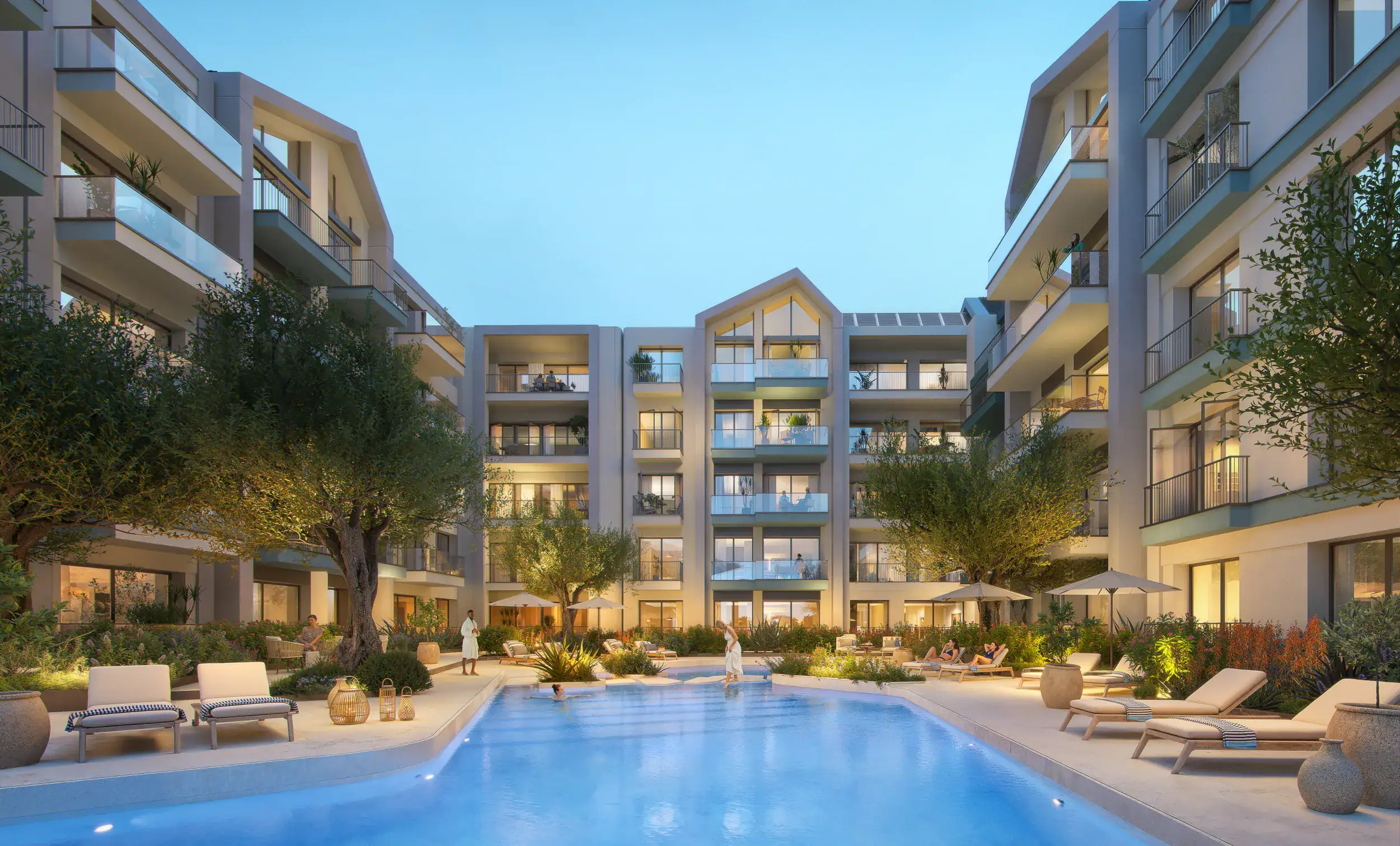 Modern Porto Montenegro residences with pool and lush landscaping.