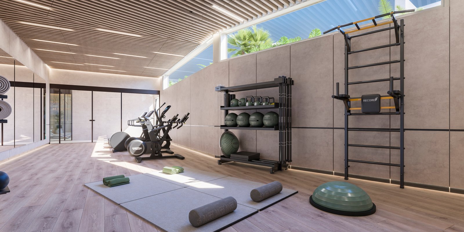 Fitness area with gym equipment and workout gear in Solenne Luxury Apartments Marbella.