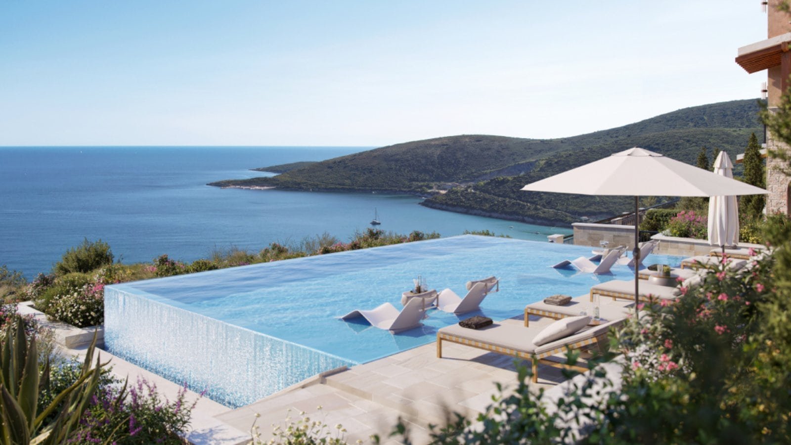 Sea view luxury apartments in Montenegro with infinity pool and stunning coastal scenery.