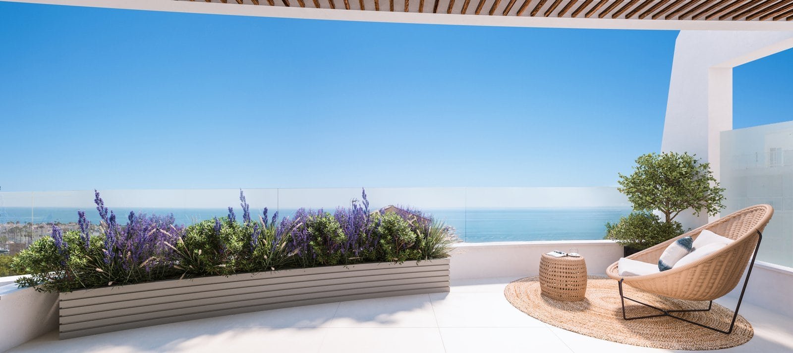 Marina Golden Bay balcony with sea view, lavender plants, and modern outdoor furniture in Benalmáden.